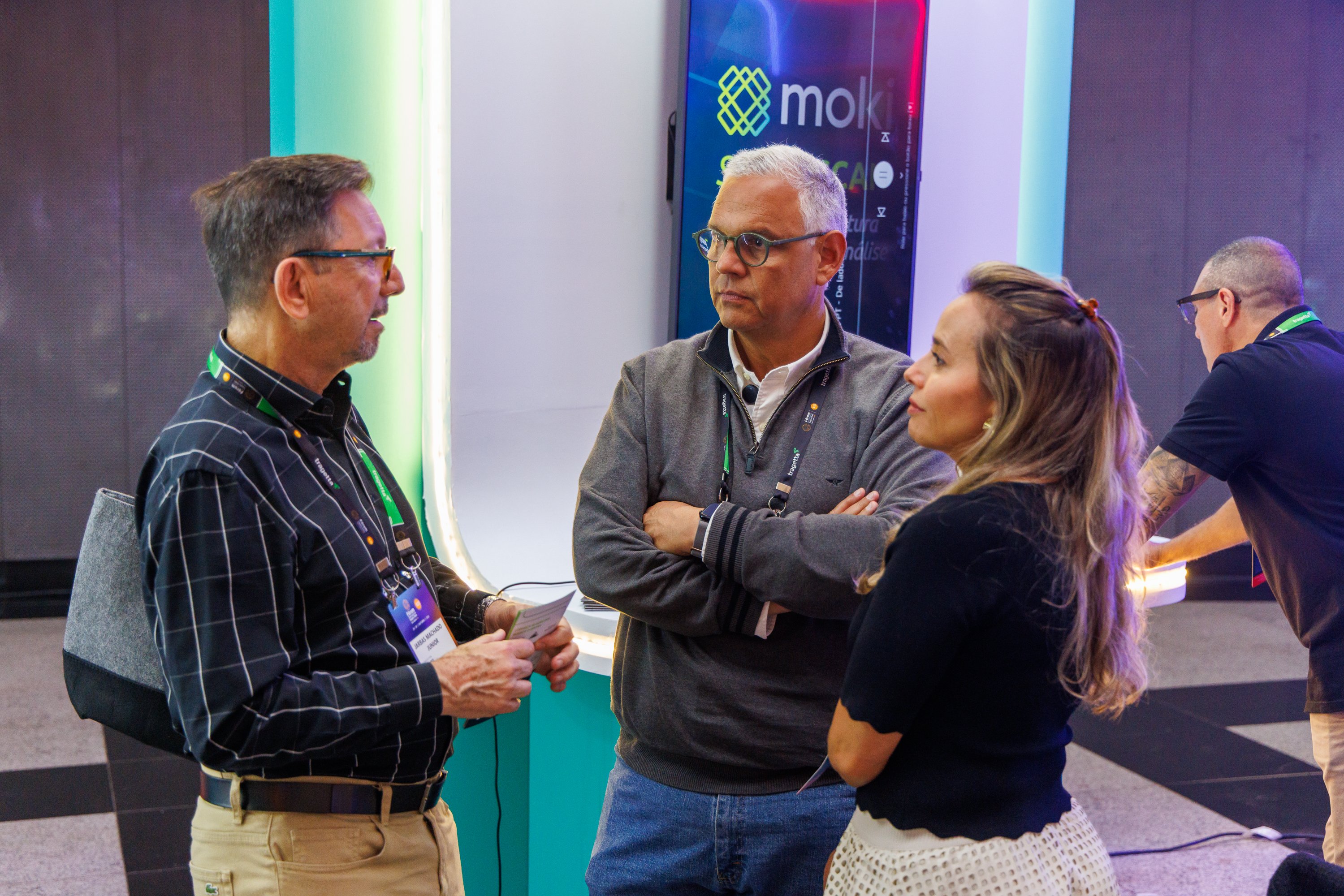Conversa no stand da Moki no Fórum ILOS 2025